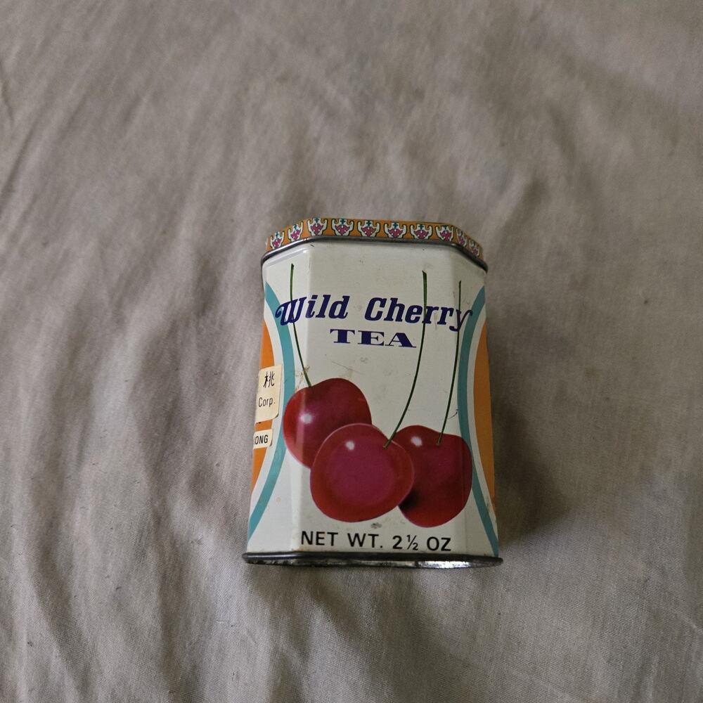 Wild Cherry Tea By Guang Sang Tea Tin 4 Inch X 3 Inch. White Red Black